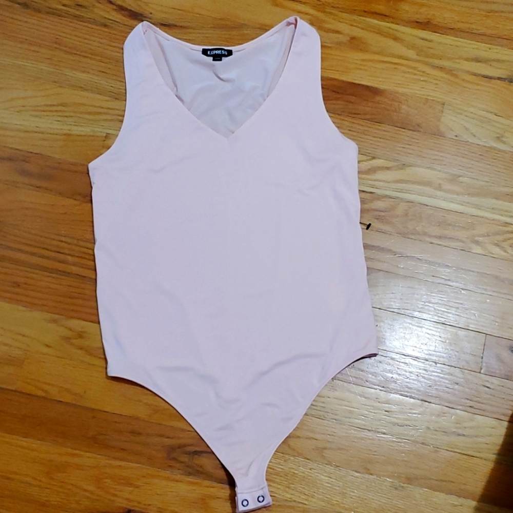 New express peach colored bodysuit. Size L